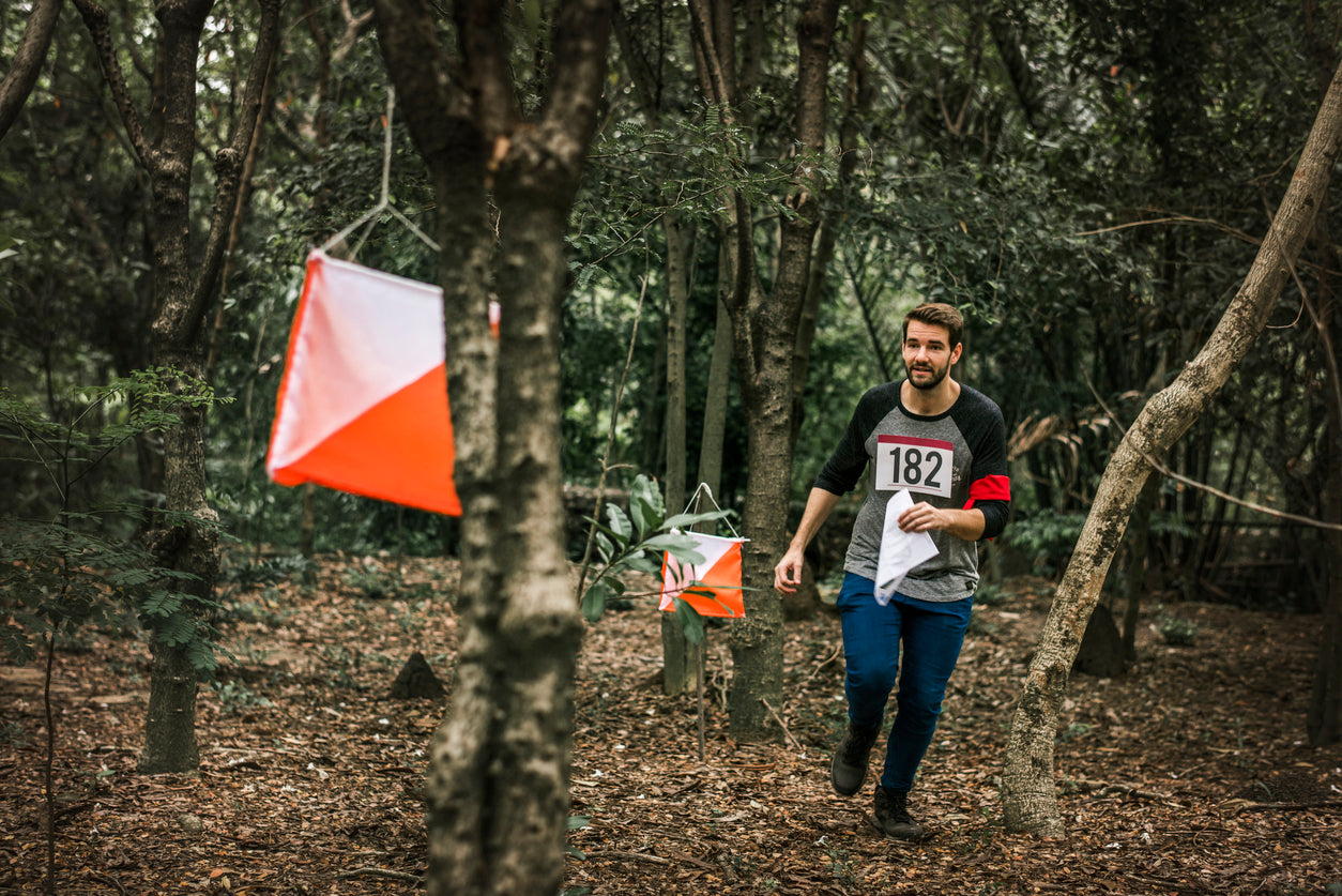 man in woodland orienteering