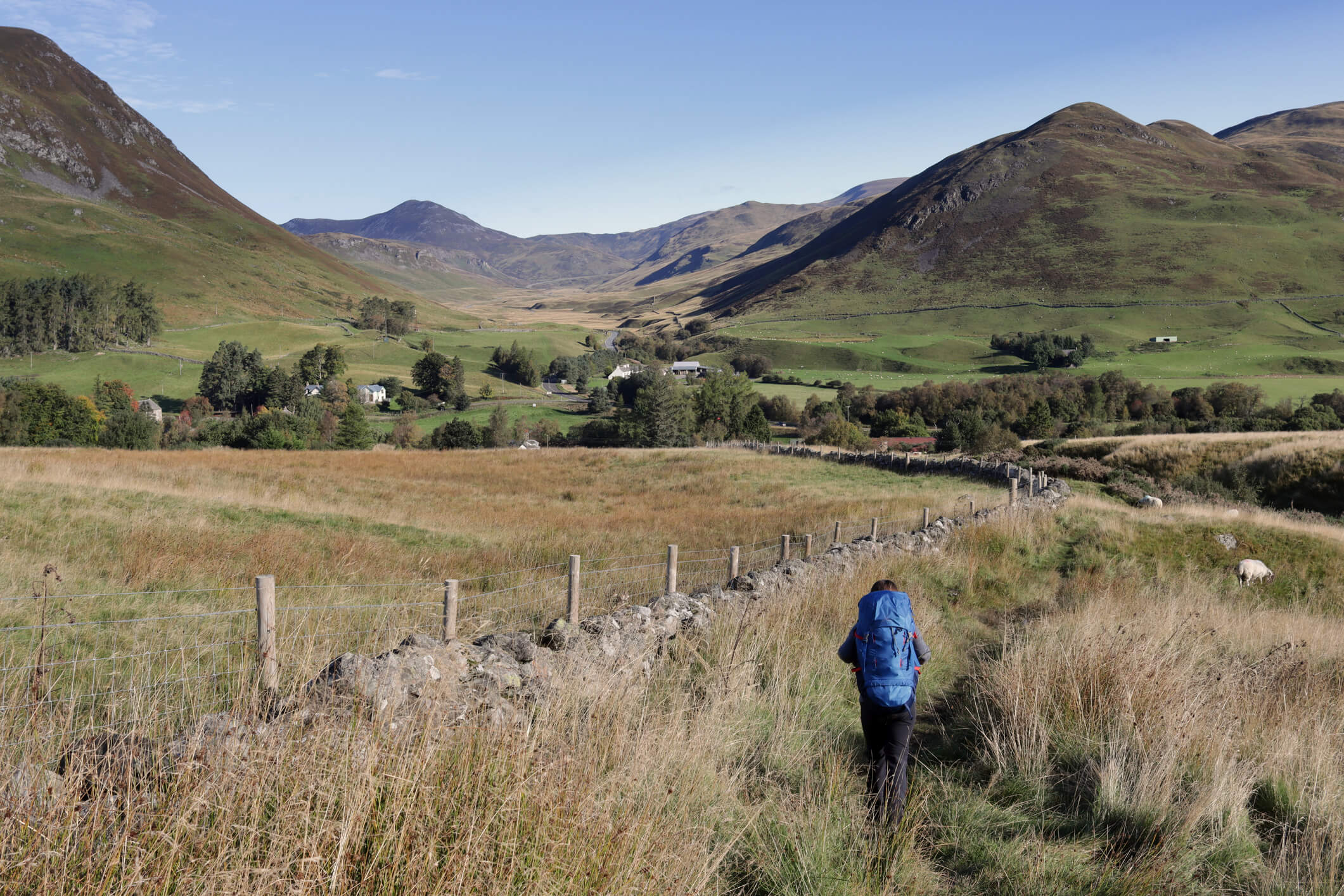 young hiker walking through moorland
