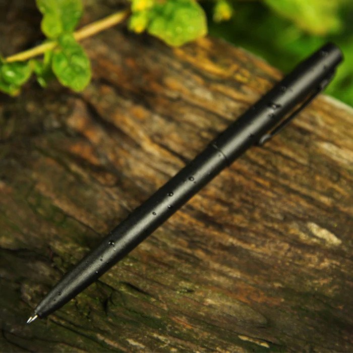Black waterproof pen placed on a tree trunk