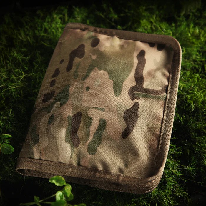 multicam cordura cover on a grass background