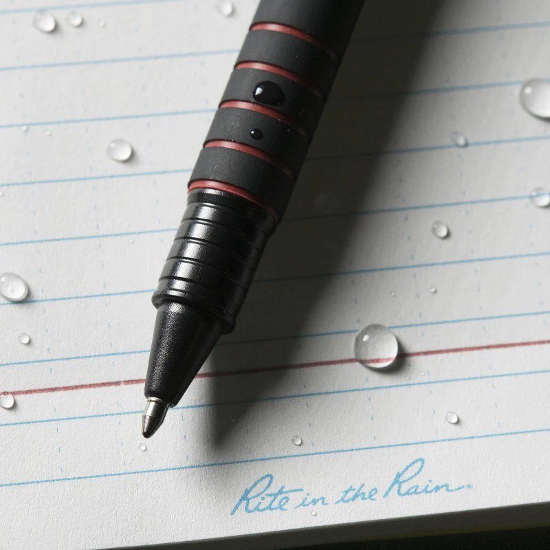 waterproof pen on waterproof paper with water droplets